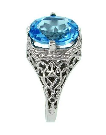 Blue Topaz Filigree Ring in 14 Karat White Gold